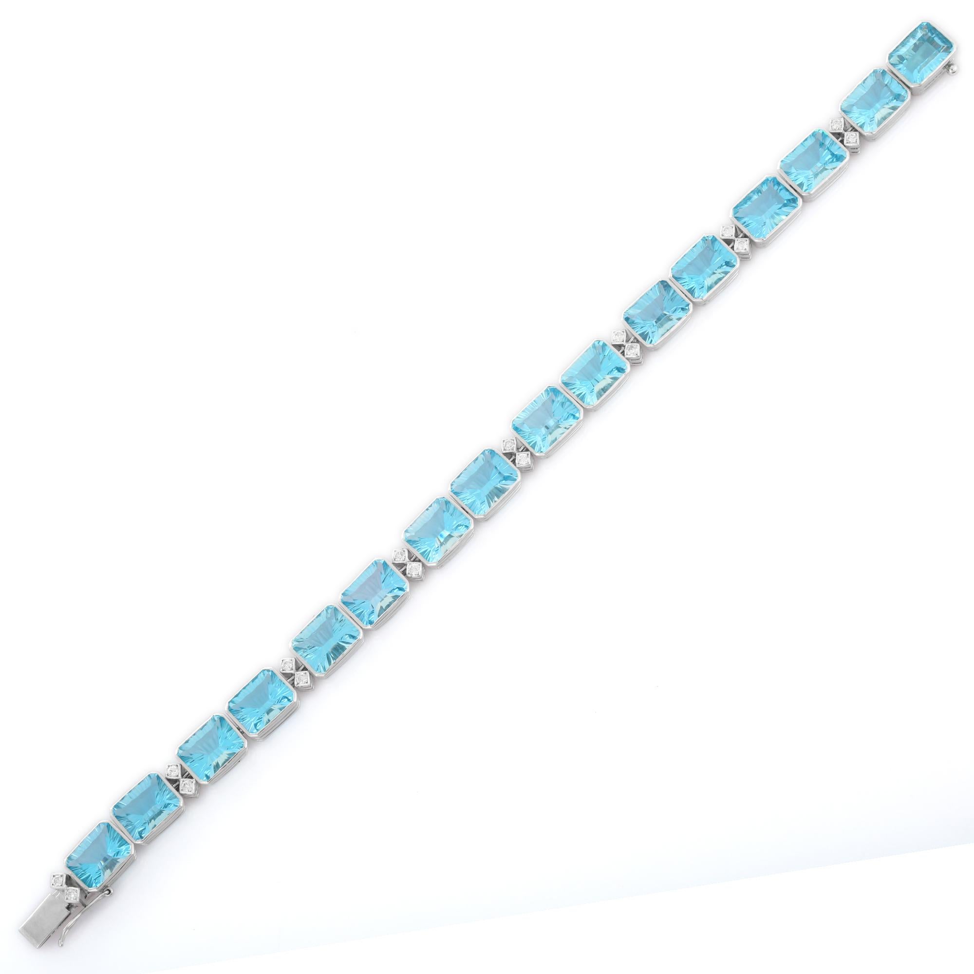 Moderne Bracelet tennis en or blanc 18 carats, diamants et topaze bleue taille fine de 40 carats en vente