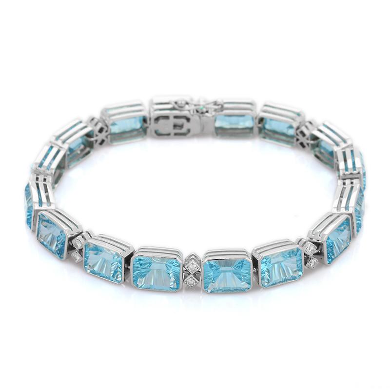 Octagon Cut 18 Karat White Gold Diamond and Fine Cut 40 Carats Blue Topaz Tennis Bracelet For Sale
