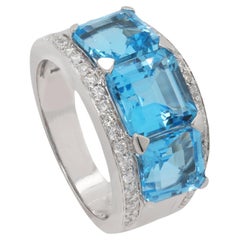 18K White Gold Blue Topaz and Natural Diamond Ring