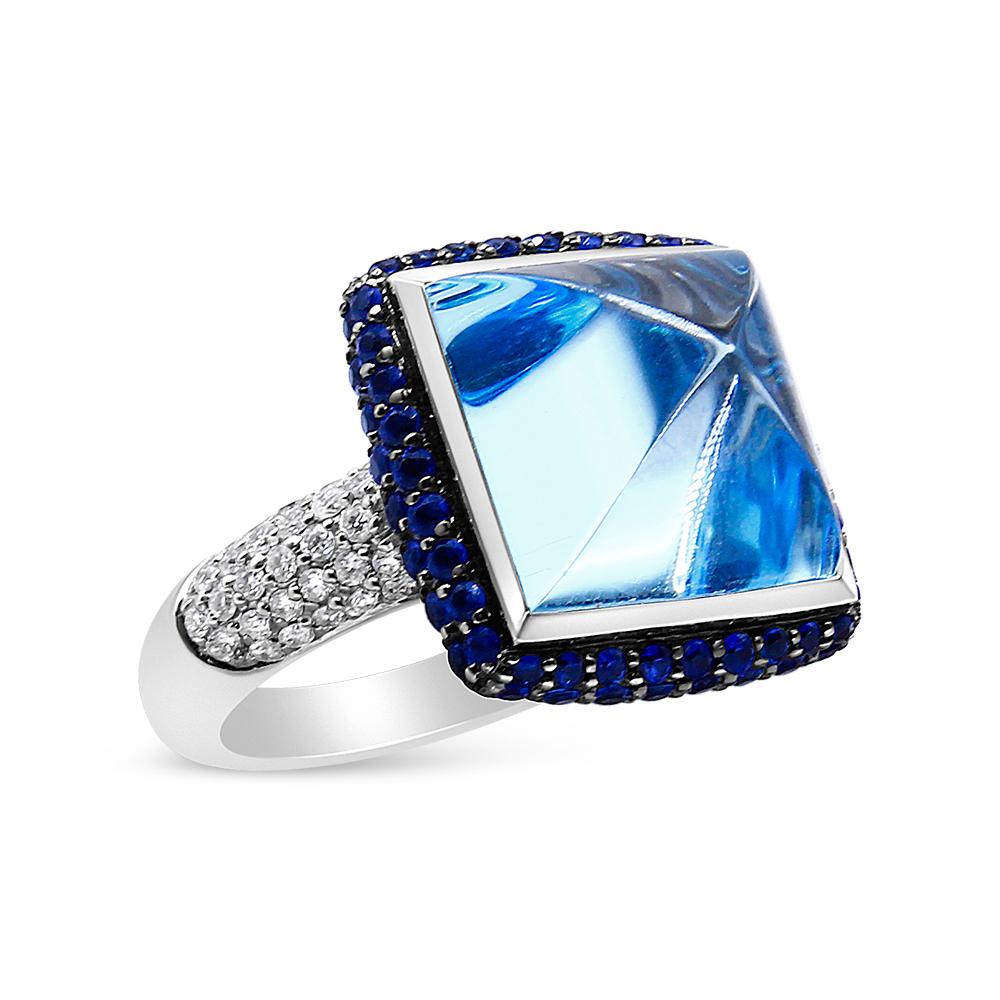 Contemporary 18K White Gold Blue Topaz Cocktail Ring with Blue Sapphire Halo Diamond Shank