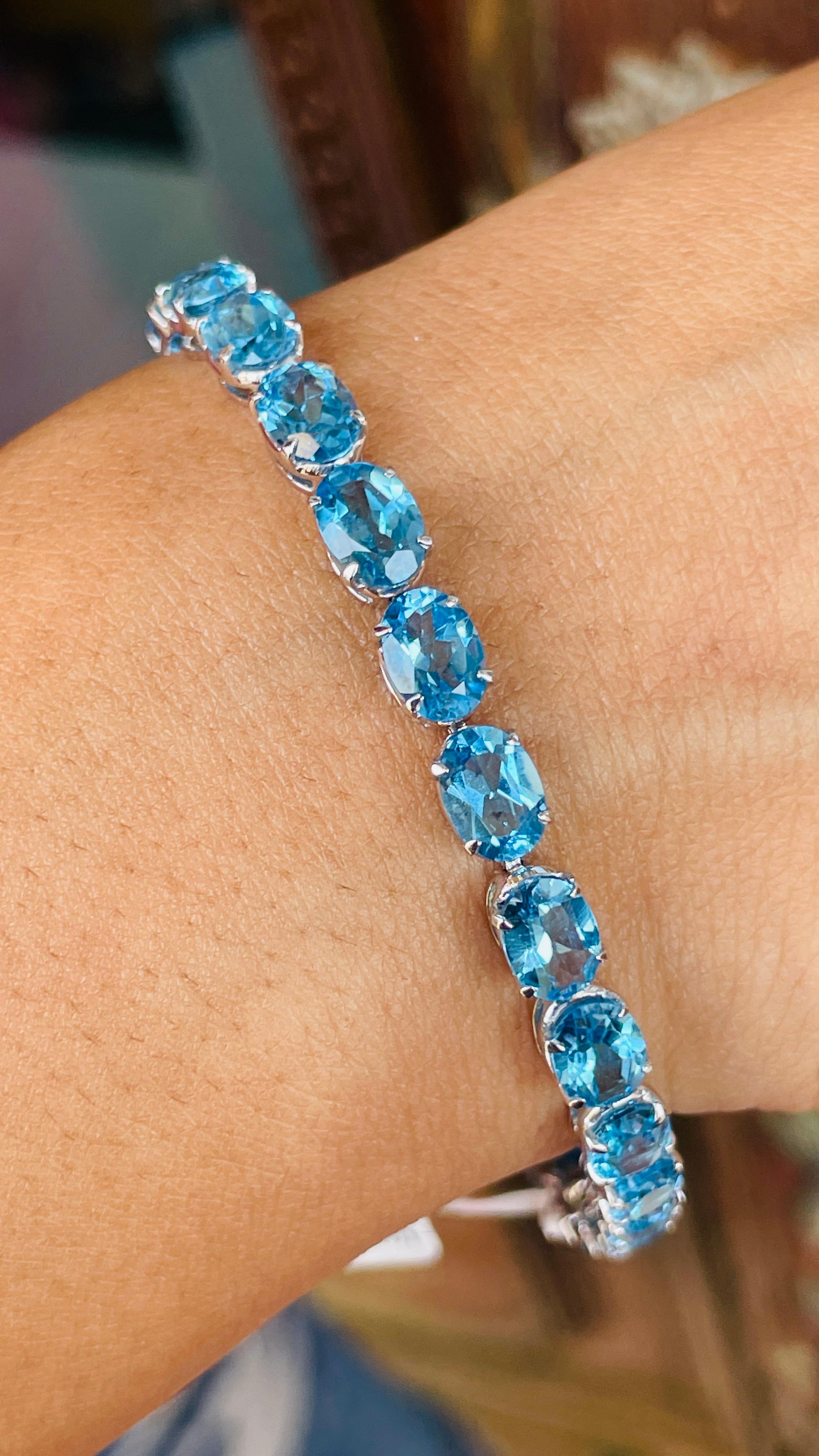 18K White Gold Blue Topaz Oval Cut Tennis Bracelet In New Condition For Sale In Houston, TX