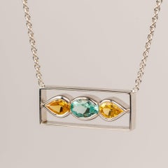 Collana a barretta in oro bianco 18k con tormalina blu e zaffiro giallo