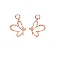Borchie in oro bianco 18k con tormalina blu e farfalle in oro rosa 18k