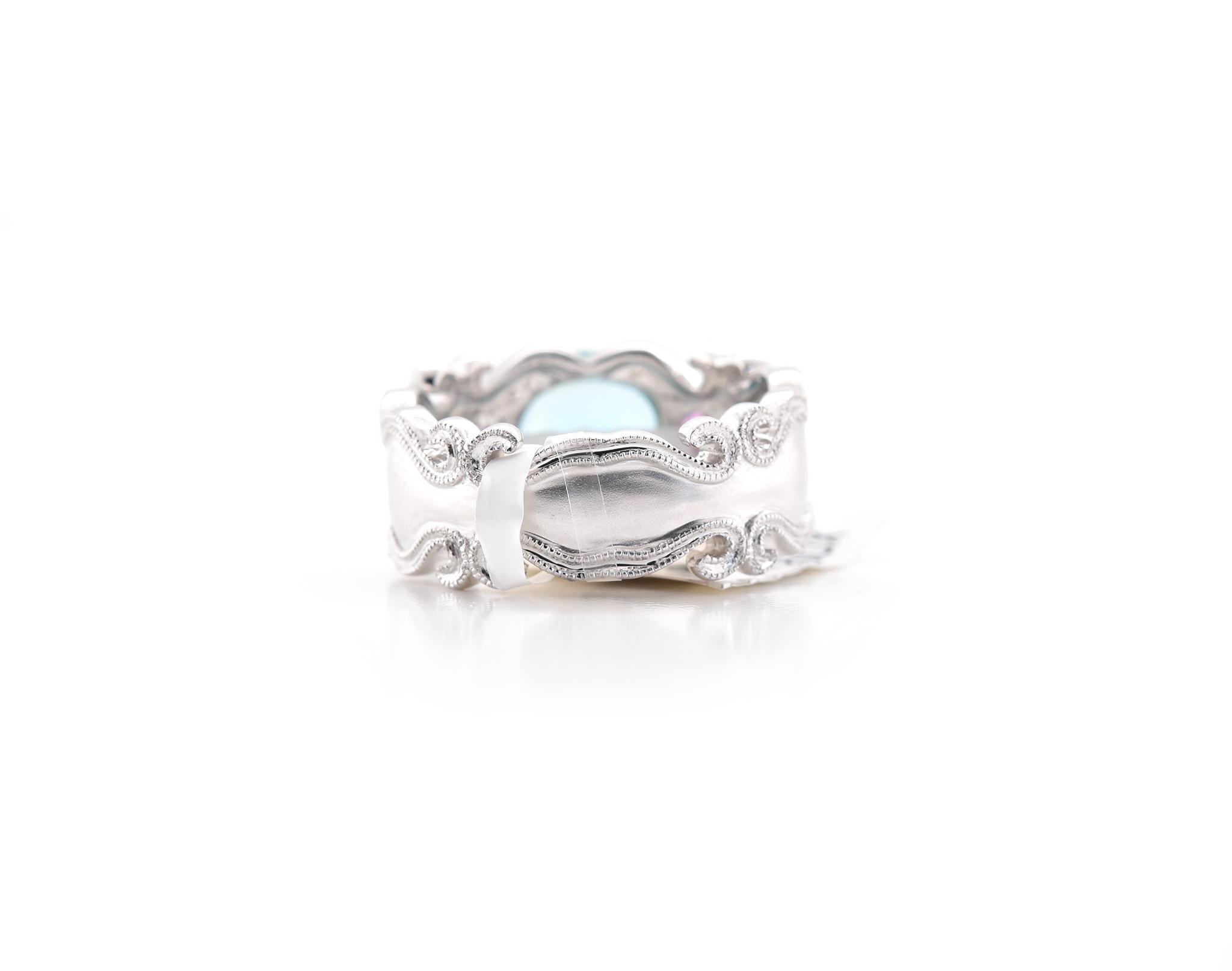 Women's 18 Karat White Gold Blue Zircon, Pink Sapphire, and Diamond Ring