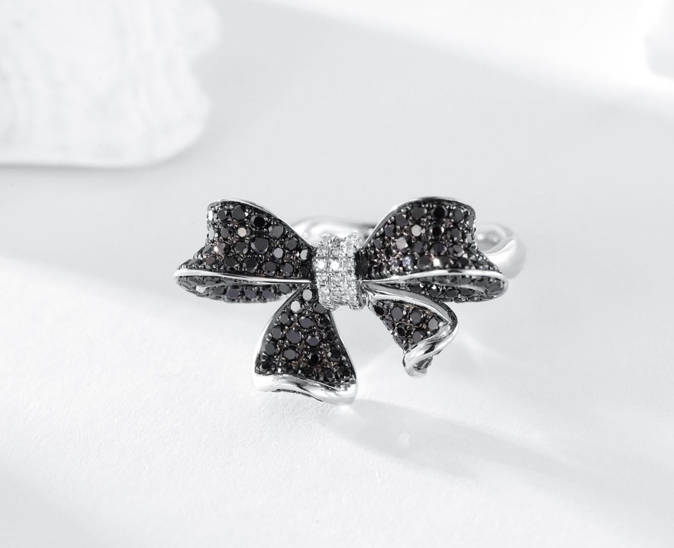 Modern 18K White Gold Bow Tie Ring with Natural Black and White Diamonds For Sale