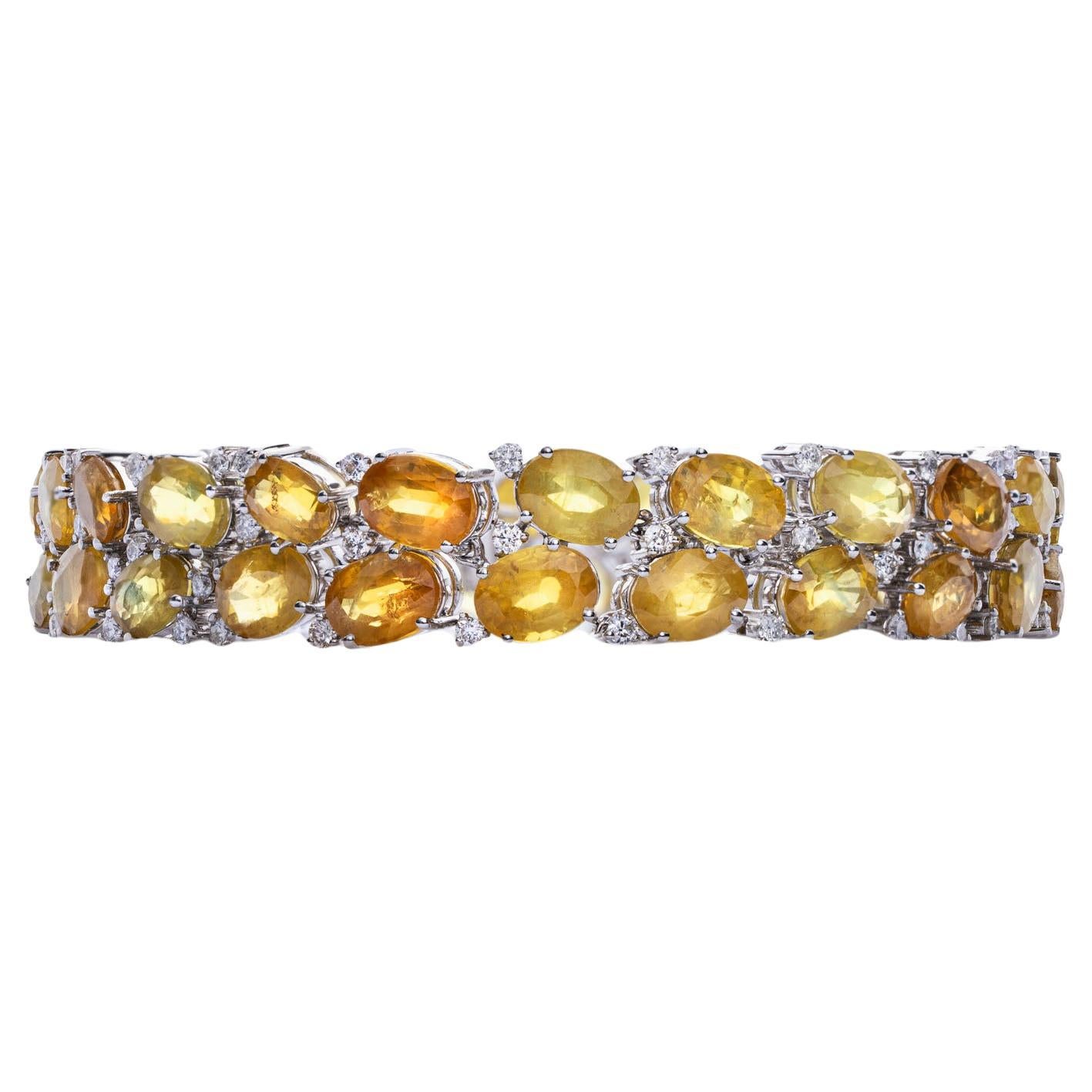 Bracciale in oro bianco 18k con zaffiri multicolore 42,52 carati e diamanti 1,98
