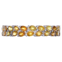 Bracciale in oro bianco 18k con zaffiri multicolore 42,52 carati e diamanti 1,98