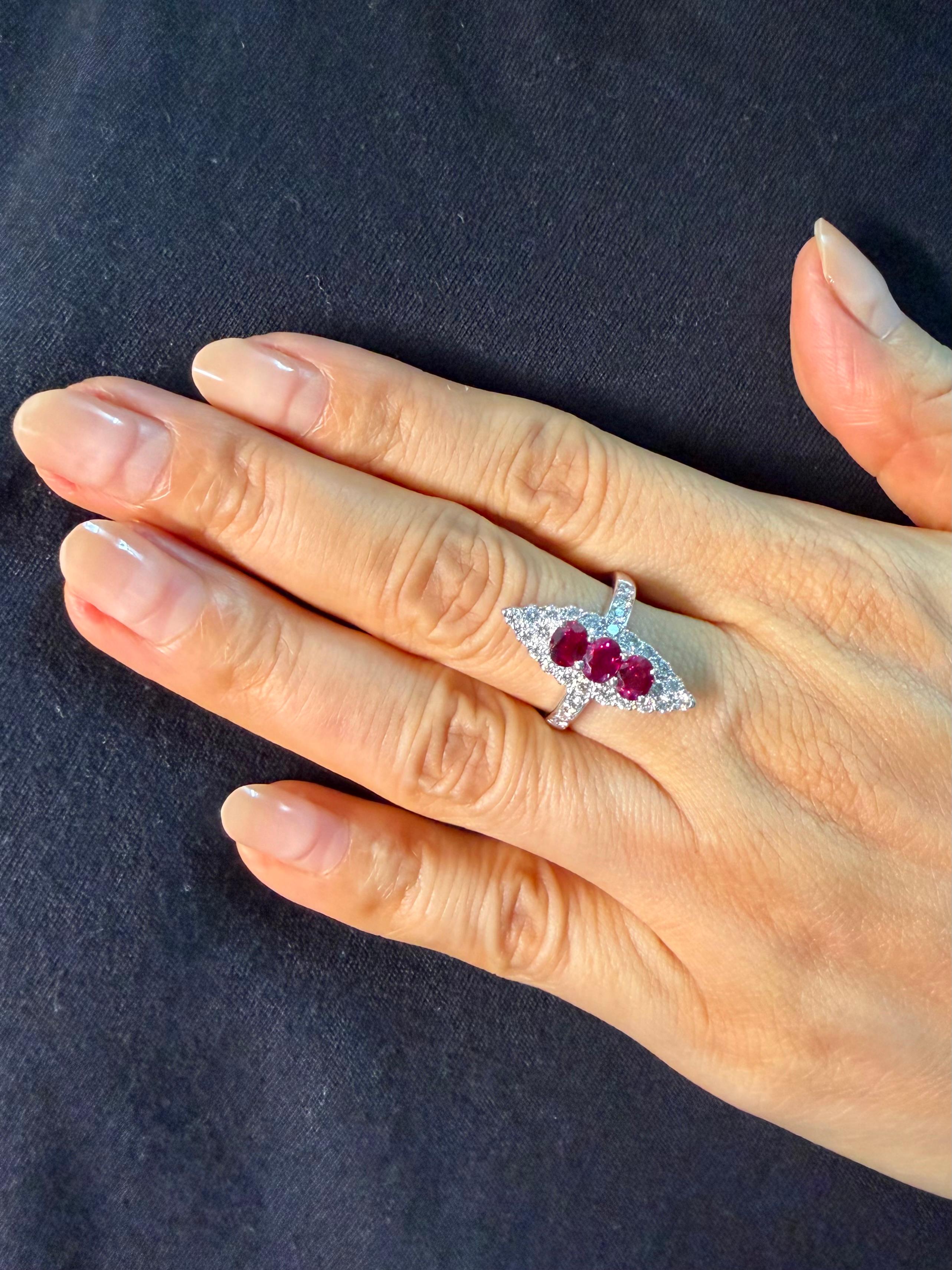 Please check out the HD video! I can personally guarantee that this ring looks nicer in person than any photos or videos! Very difficult to capture the color but this is a very nice piece! Here is a nice vivid red Ruby and diamond ring. The ring is