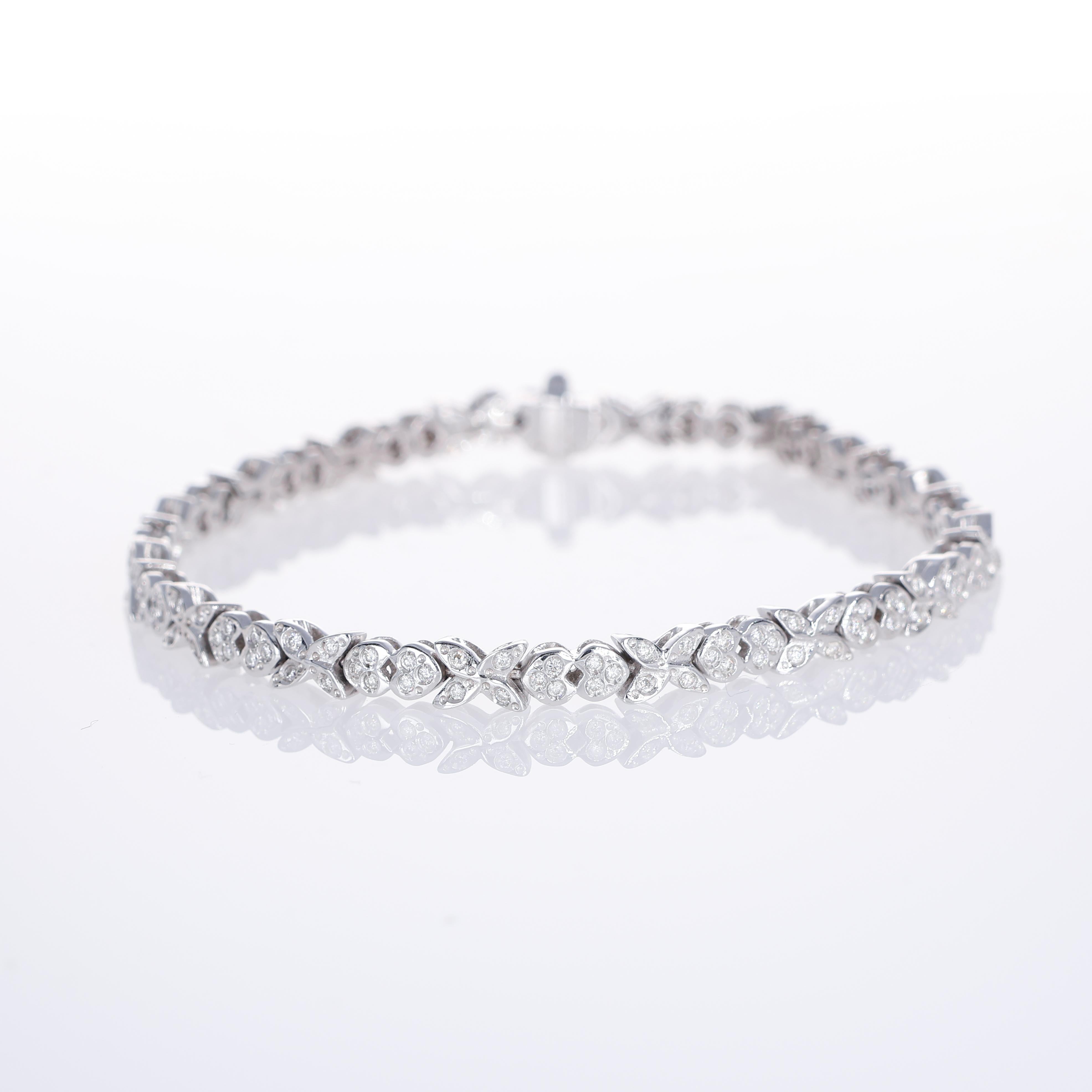 Brilliant Cut 18K White Gold Butterfly Heart Tennis Bracelet with 3.98 Carats of Diamonds For Sale
