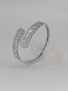 18K White Gold Bypass Bangle w/Baguette & Round cut diamonds