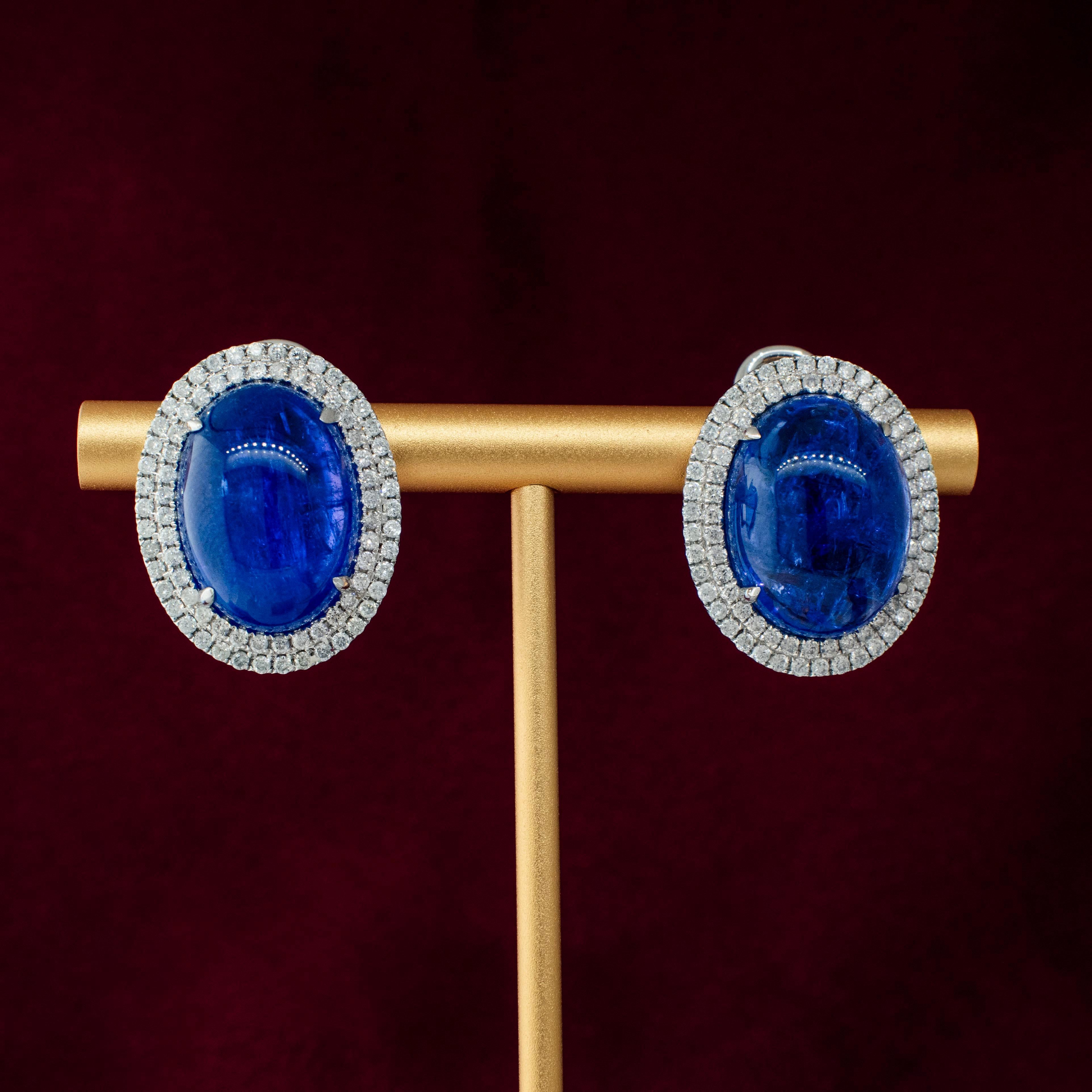 Contemporary 18K White Gold Cabochon 26 carat Tanzanite and Diamond Earrings with Omega Backs For Sale
