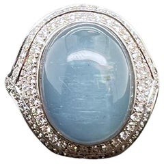 Bague aigue-marine cabochon en or blanc 18 carats avec lapis-lazuli et diamants