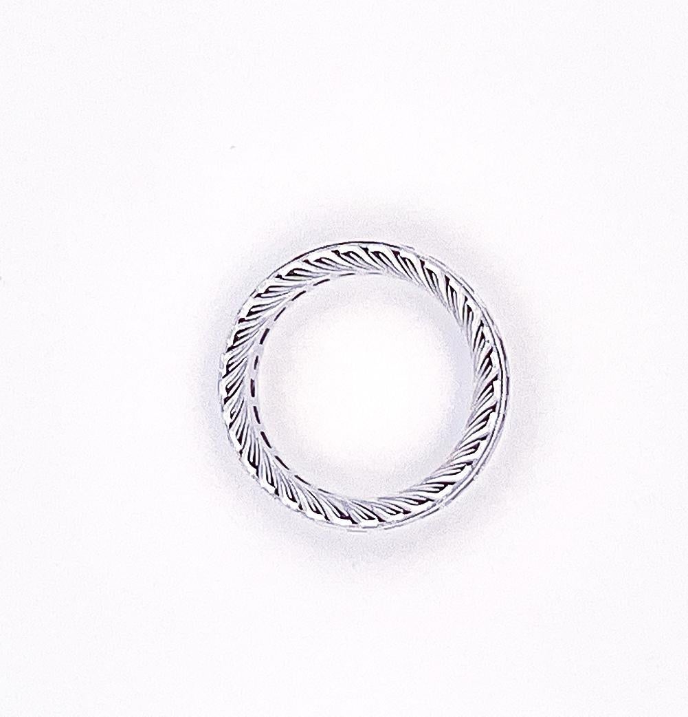 Modern 18k White Gold Calibre Ruby Eternity Ring For Sale