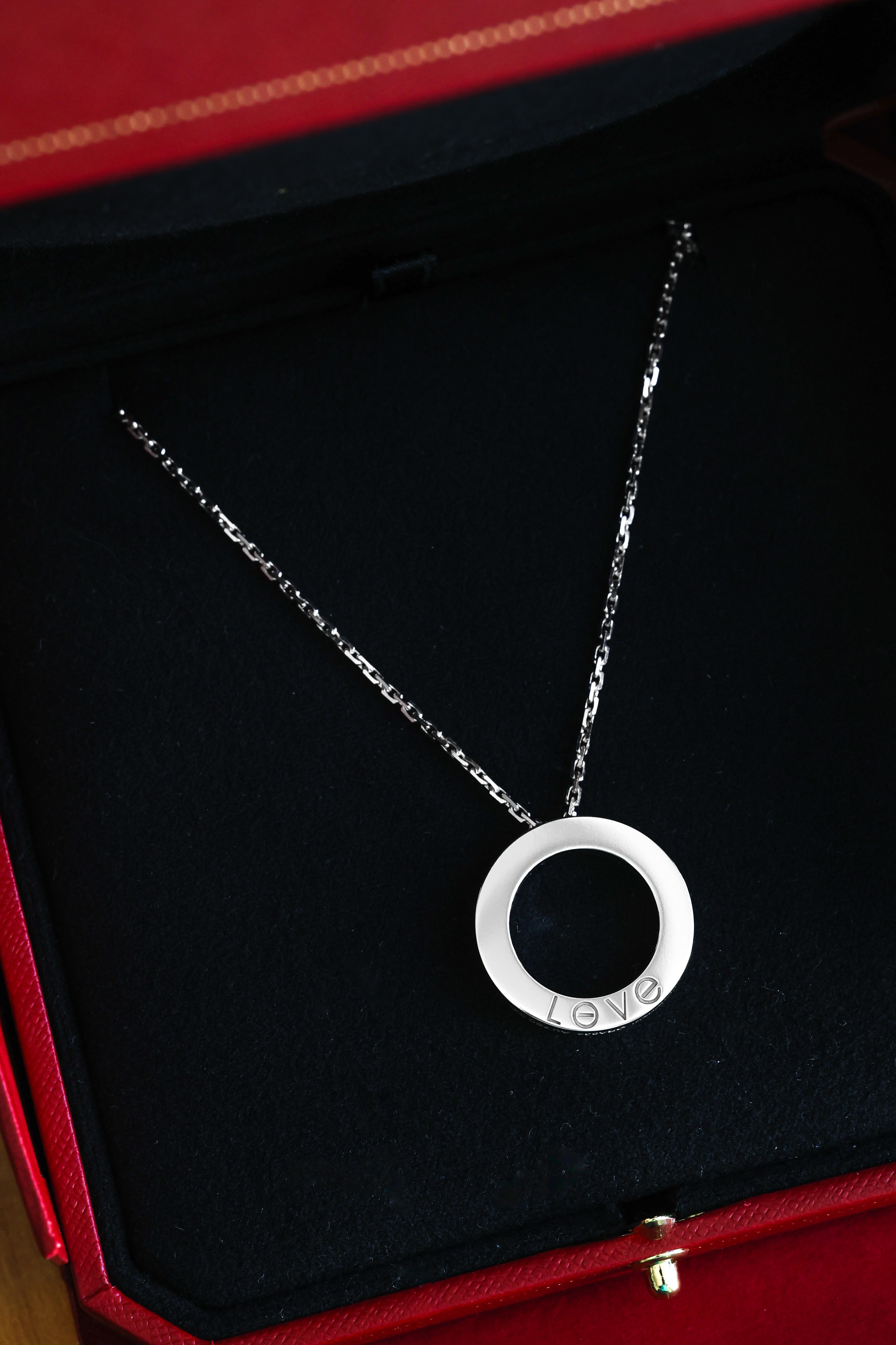 LOVE necklace, 18K white gold (750/1000), set with 54 brilliant-cut diamonds totaling 0.34 carats. Inner diameter 15.95mm. Chain length: 420mm.