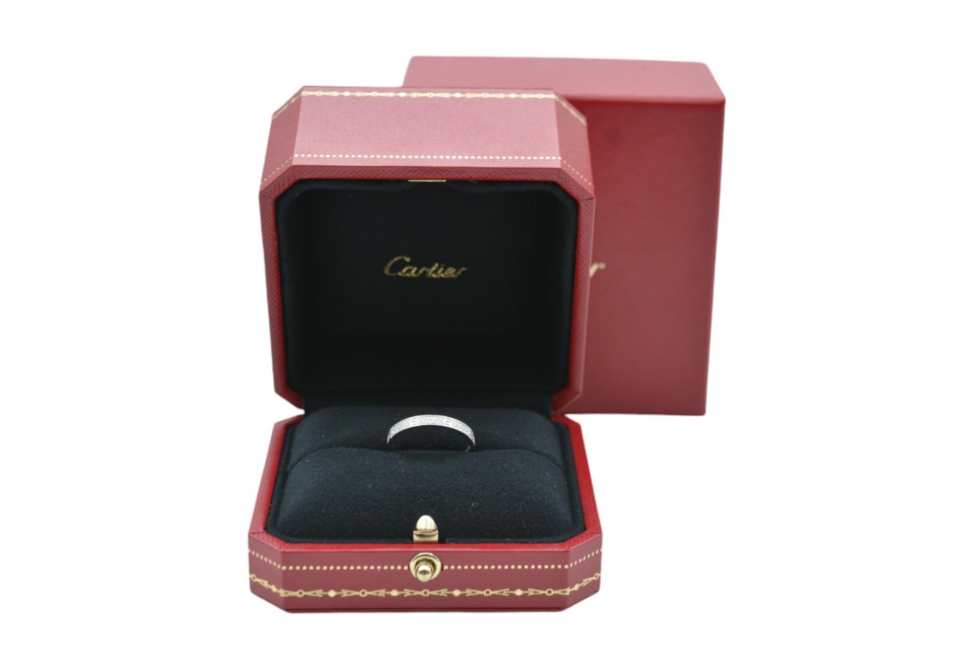 The Cartier Love Ring with diamonds is an iconic symbol of enduring love and luxury, crafted by one of the world’s most prestigious jewelry houses. Made from exquisite 18K white gold, this ring is adorned with Cartier's signature screw motifs and