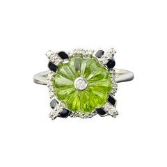 18K White Gold Carved Peridot, Diamond 
Black Enamal Ring