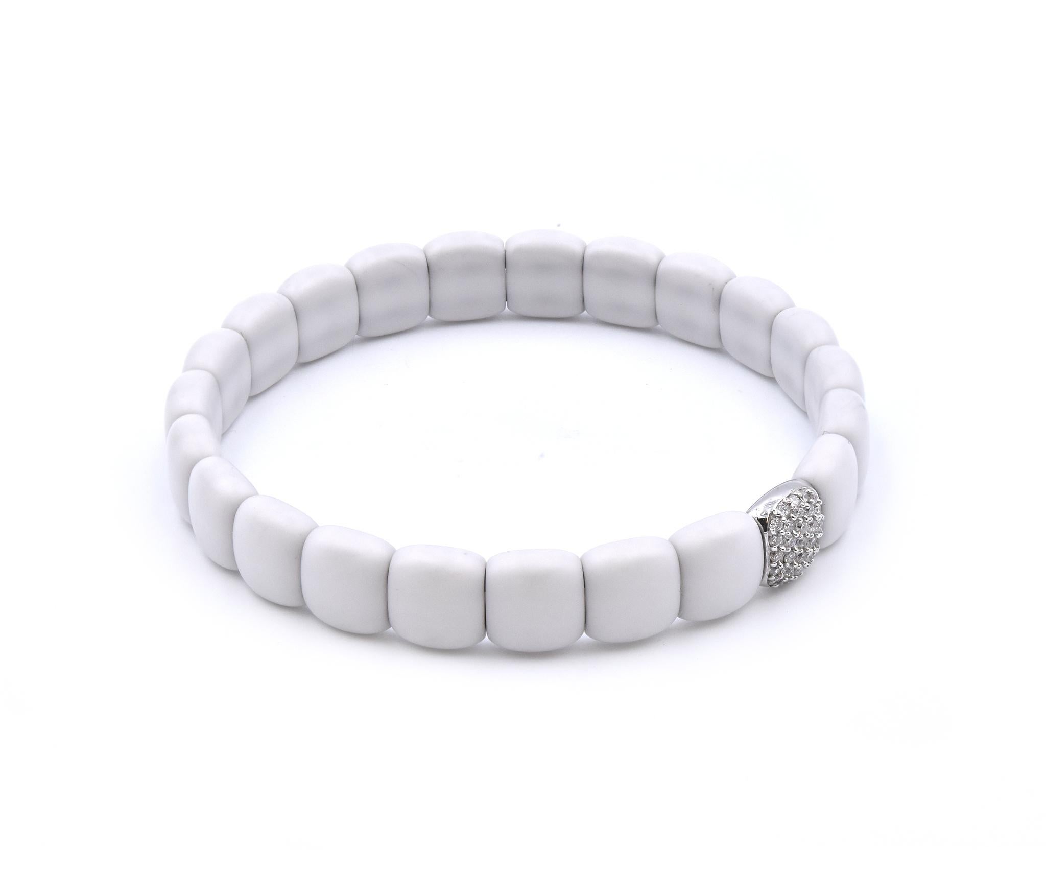 Designer: custom
Material: 18k white gold
Diamonds: 27 round brilliant cuts= .27cttw
Color: G
Clarity: VS
Dimensions: bracelet will fit up to an 8 inch wrist 
Weight: 30.61 grams