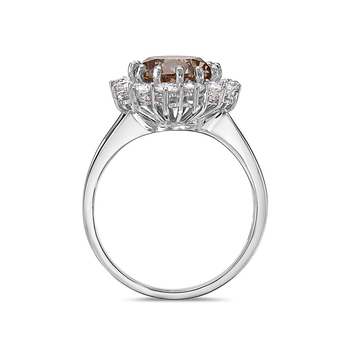 This engagement ring features a 3.04 carat brown/champagne center stone and approximately 0.90 ct. of white diamonds G/H VS/SI
Size 7
Made in Italy

Resizing available upon request