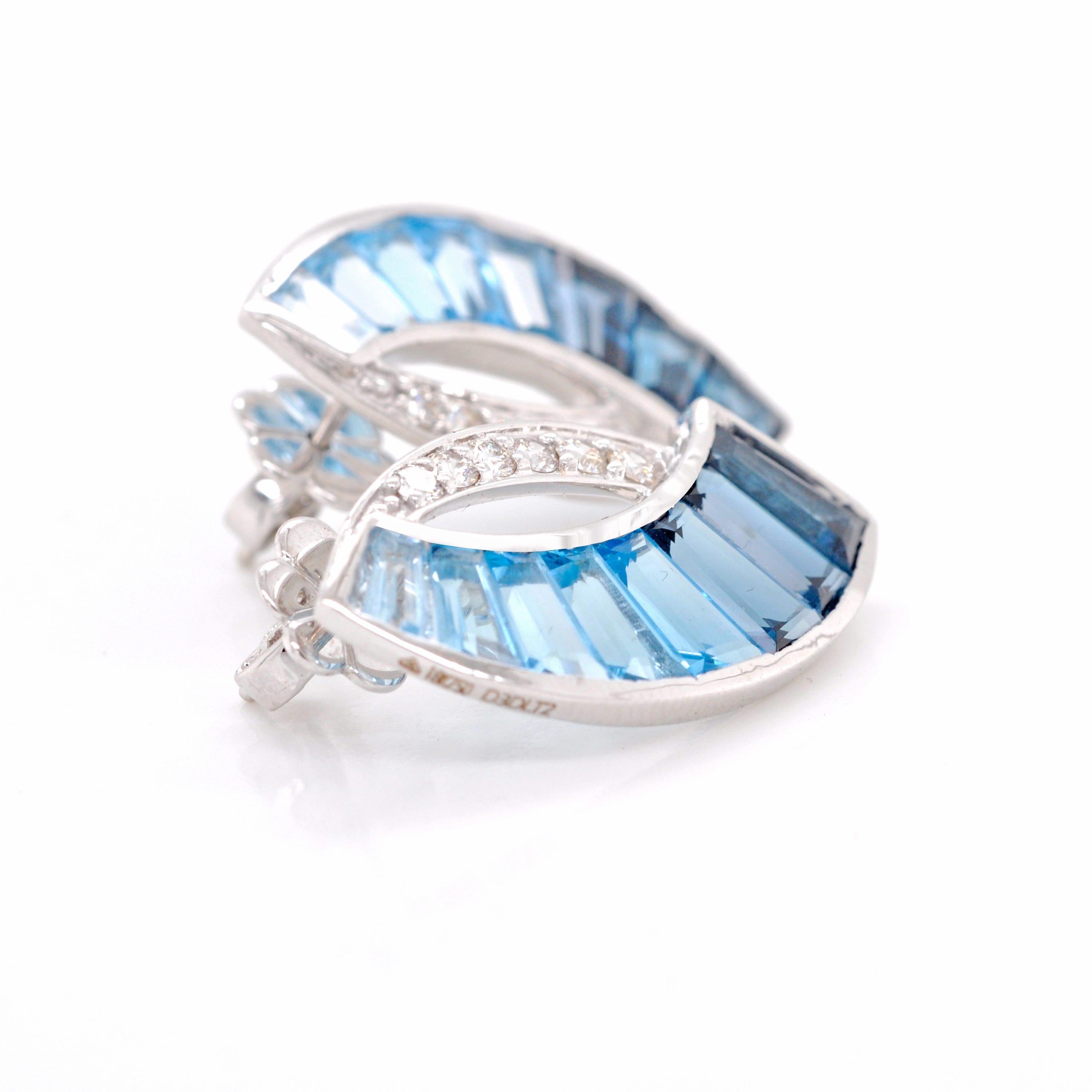 Women's or Men's 18K White Gold Channel Set Tapered Baguettes Blue Topaz Sword Stud Earrings For Sale