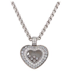 Pendentif Chopard Happy en or blanc 18 carats et diamants 1,57 carat