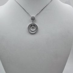 18k White Gold Circle Pendant with Diamonds and 15" Necklace.