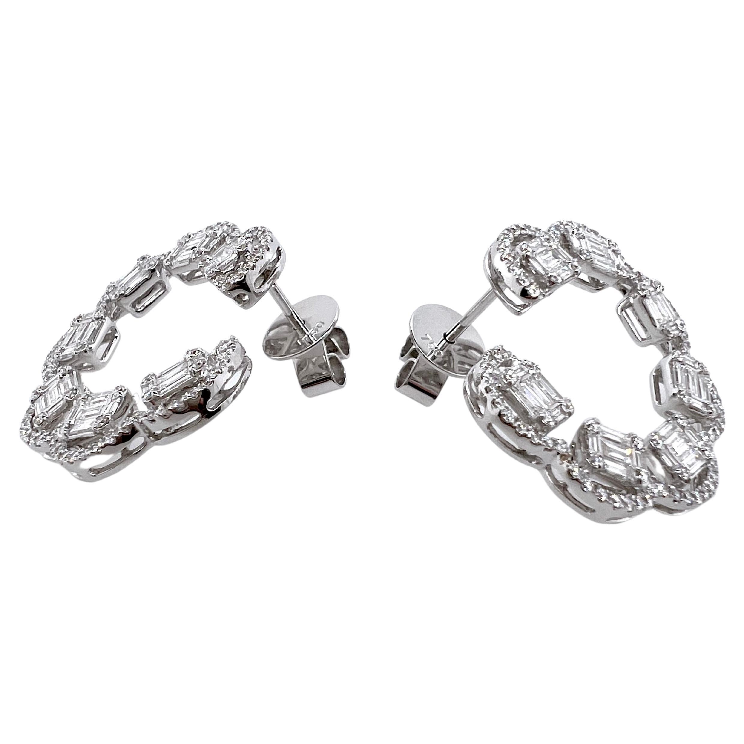 These unique circular shaped diamond earrings will grasp everyone's attention.  The baguettes and round brilliant precisely placed throughout the circular frame.  This earrings are a must-have!


Diamonds: 1.94 cts, Round Brilliant  Baguette
Metal: