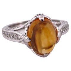 Anello in oro bianco 18 carati con citrino e diamante H. H. 2 da 0,61 ct.