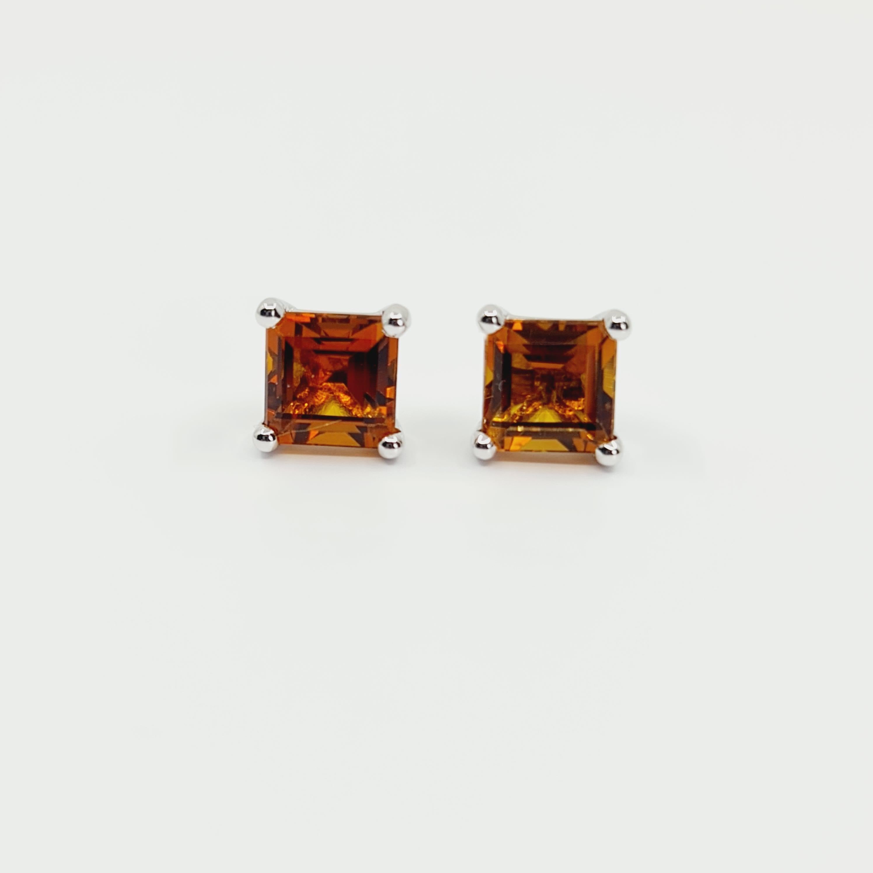 18K White Gold Citrine Studs 3.60 Carat 1.1x1.1cm.
2x 1.80ct Square Cut Citrine Stones. 
High Gloss Polish. Rhodium Plated

Made on demand in Germany.
Production time 2-3 weeks
Feel free to contact us if any questions may arise.

You are looking for