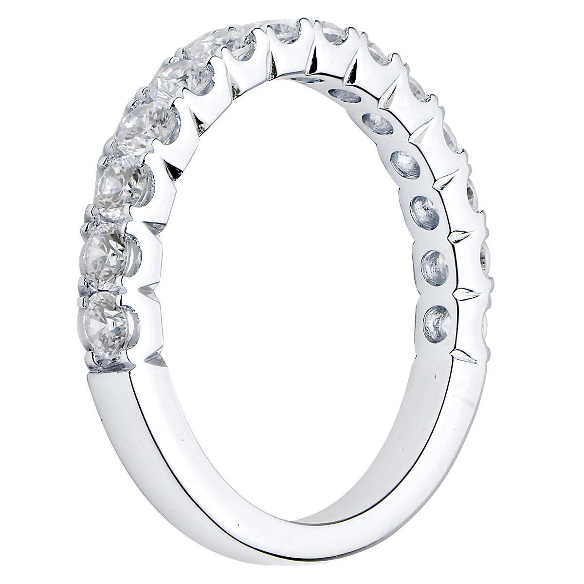 This stunning 18 karat white gold band is made from 3.0 grams of gold. There are 14 round VS2, G color diamonds totaling 0.83 carats giving this band a larger diamond look. The prongs on this ring are beautiful and it is size 7. 