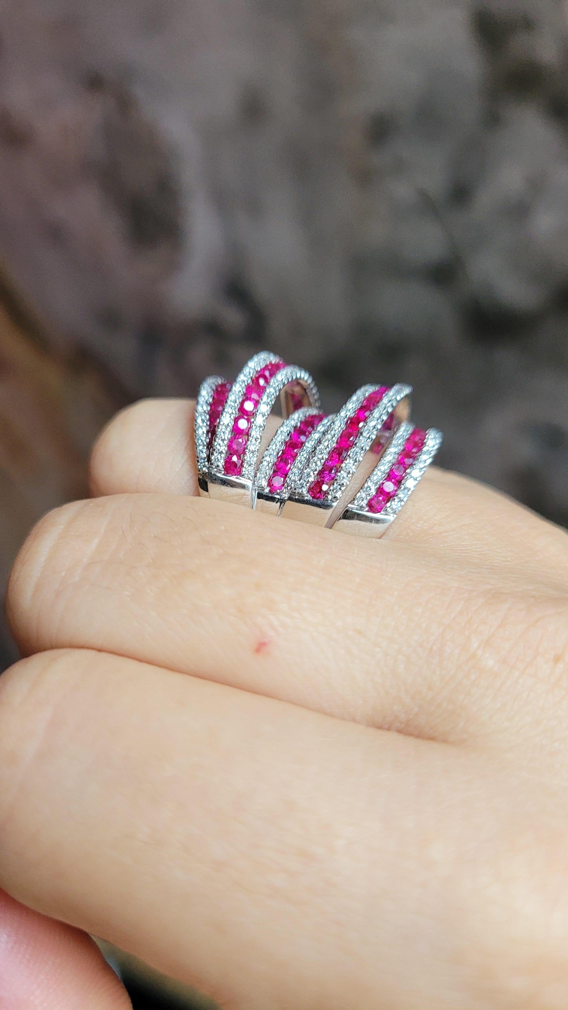 18K WHITE GOLD RING WITH DIAMOND & PINK SAPPHIRES. Inspired by De Grisogono 

Special piece with twisted overlapping super special handcraftmanship 
18KW  - 16.69gm
75 ROUND - 3.39 CT
220 ROUND DIAMONDS -1.49 CT

SIZE - US 6.5 
