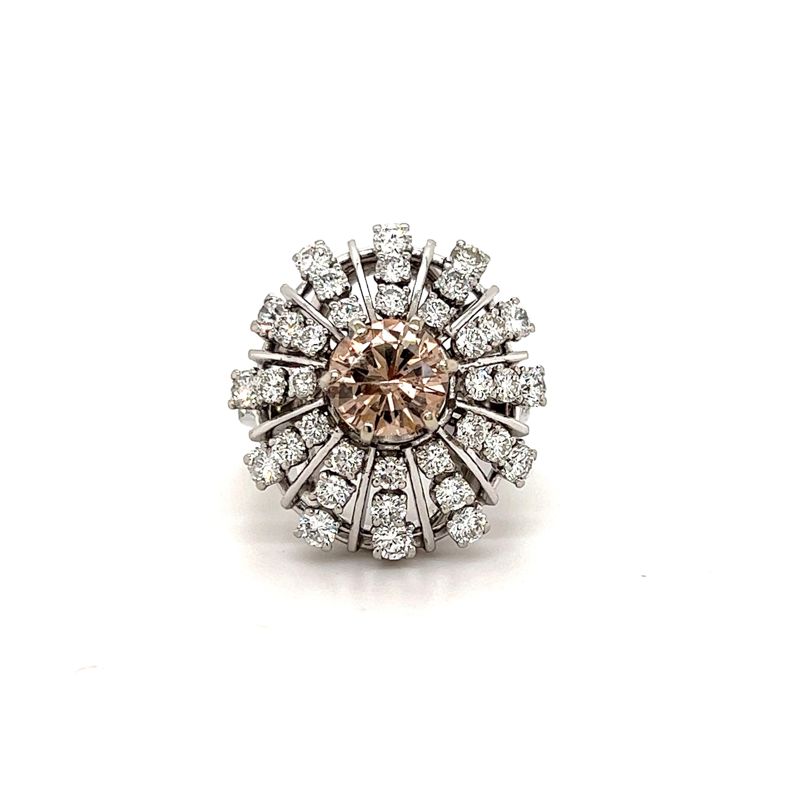 18K White Gold Cognac and White Diamond Cocktail Ring

This unique basket style ring features a round cut, apprx. 1.25ct. Champagne Diamond center surrounded by 12 rows of diamonds.

Apprx. 3.00ct. G color VS-SI Clarity diamonds total weight. 

Ring
