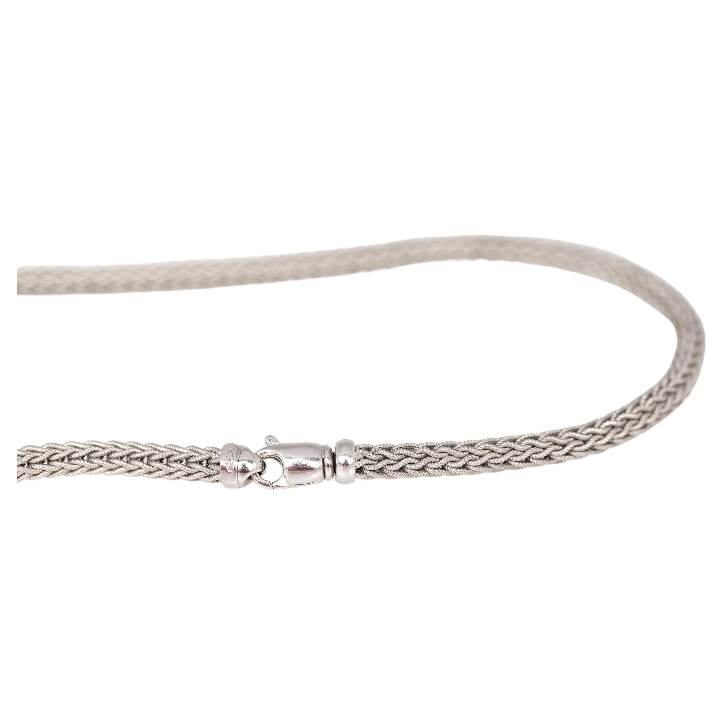 18K White Gold Chain Cord Snake or Fox Tail Link. Created in 1990,  it is still modern and only gains in value.

Beautiful snake-like 18K White Gold chain. Almost 17 inches (43 cm) in length. Fine craft of the chain with neatly woven links create a