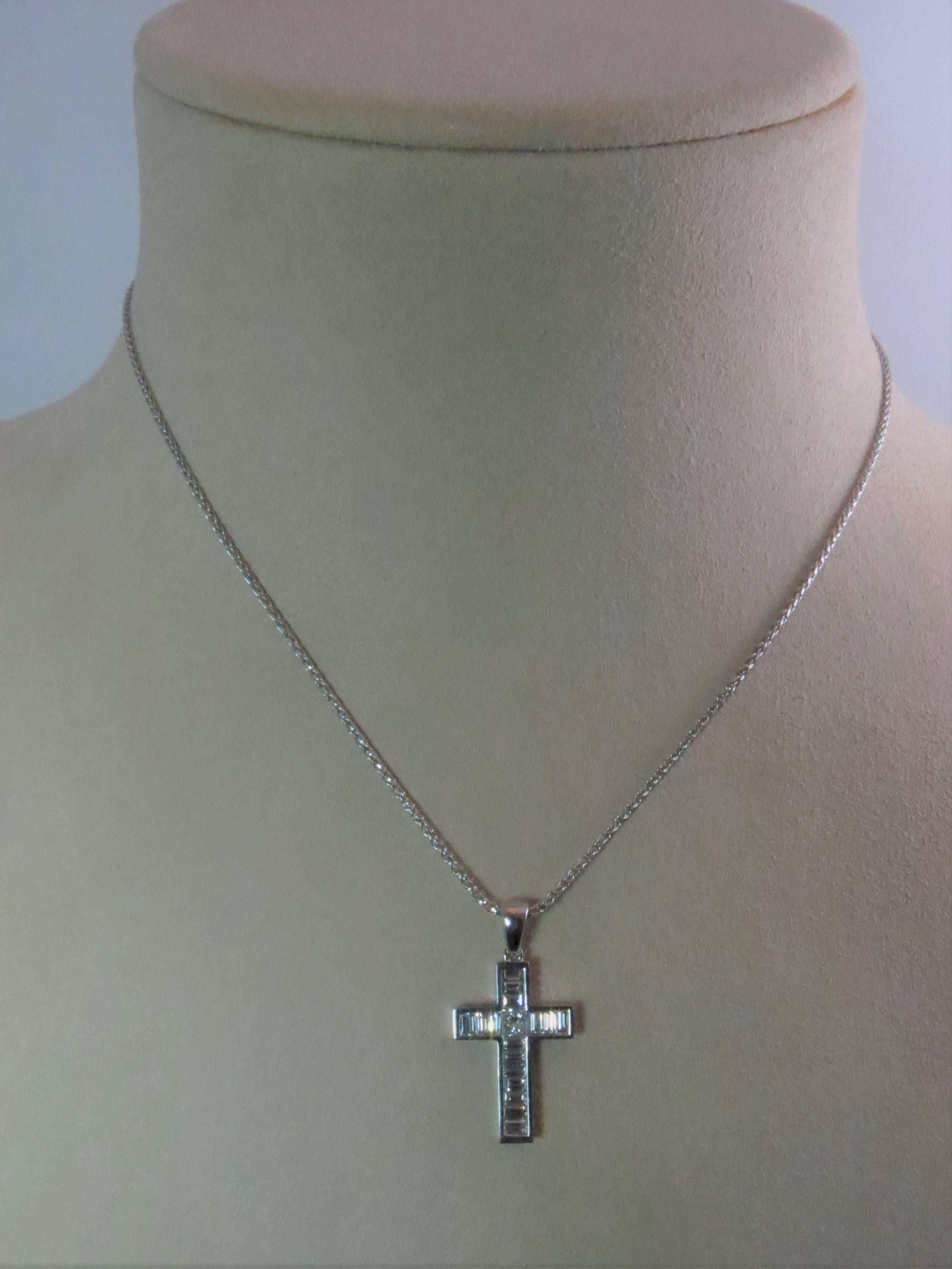 Contemporary 18 Karat White Gold Cross Set with Baguette and Princess Cut Diamonds on Chain For Sale