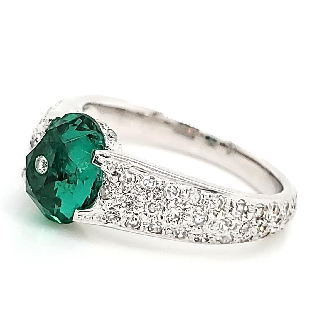 Women's 18k White Gold Cts 1.45 Oval Emerald and Diamond Engagement Ring For Sale