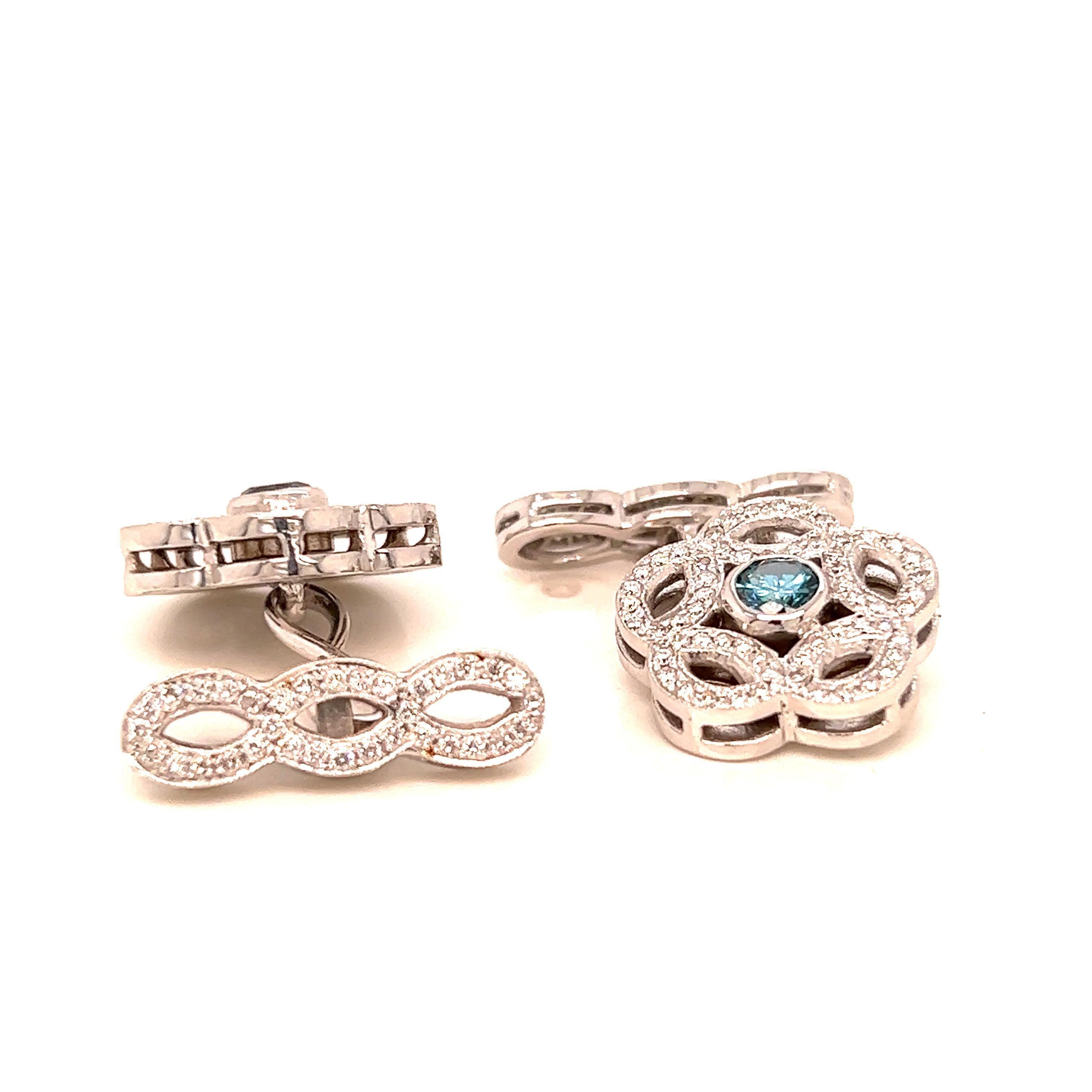 These exquisite cufflinks are a true testament to the beauty and craftsmanship of fine jewelry. Crafted from lustrous 18k white gold, each cufflink features a delicate flower design that is adorned with approximately 0.80 carats of brilliant white
