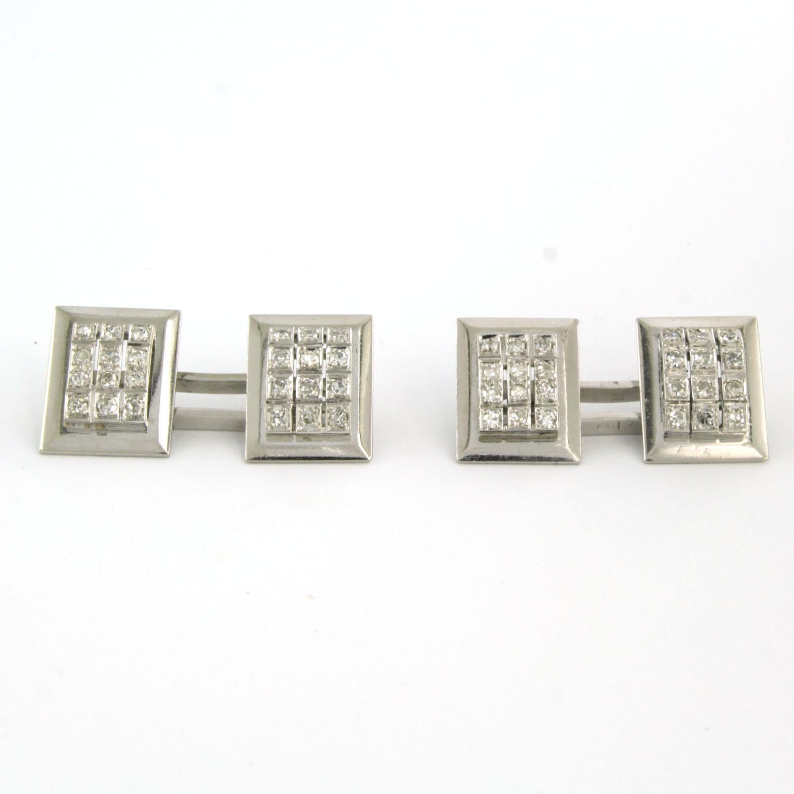 18k white gold cufflinks set with single cut diamond up to 0.70ct - F/G - VS/SI

detailed description:

The top of the cufflink is in a rectangular shape 1.3 cm by 1.0 cm wide

Weight 12.4 grams

Set with

- 48 x 1.5 mm single cut diamond total
