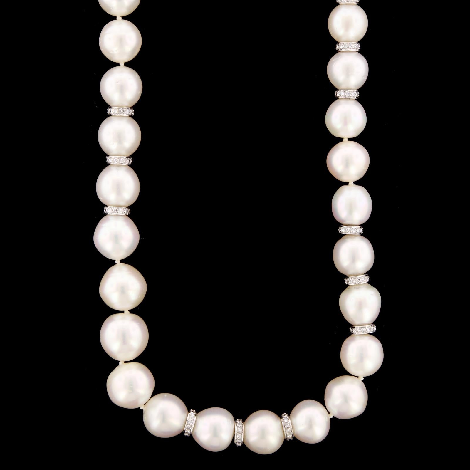 18K White Gold Cultured South Sea Pearl and Diamond Necklace. The necklace is
comprised of 73 cultured South Sea pearls ranging in size from 10.34 to 14.00mm.
GIA report #2201519612, stating that 40 pearls were tested, saltwater cultured, Pinctada