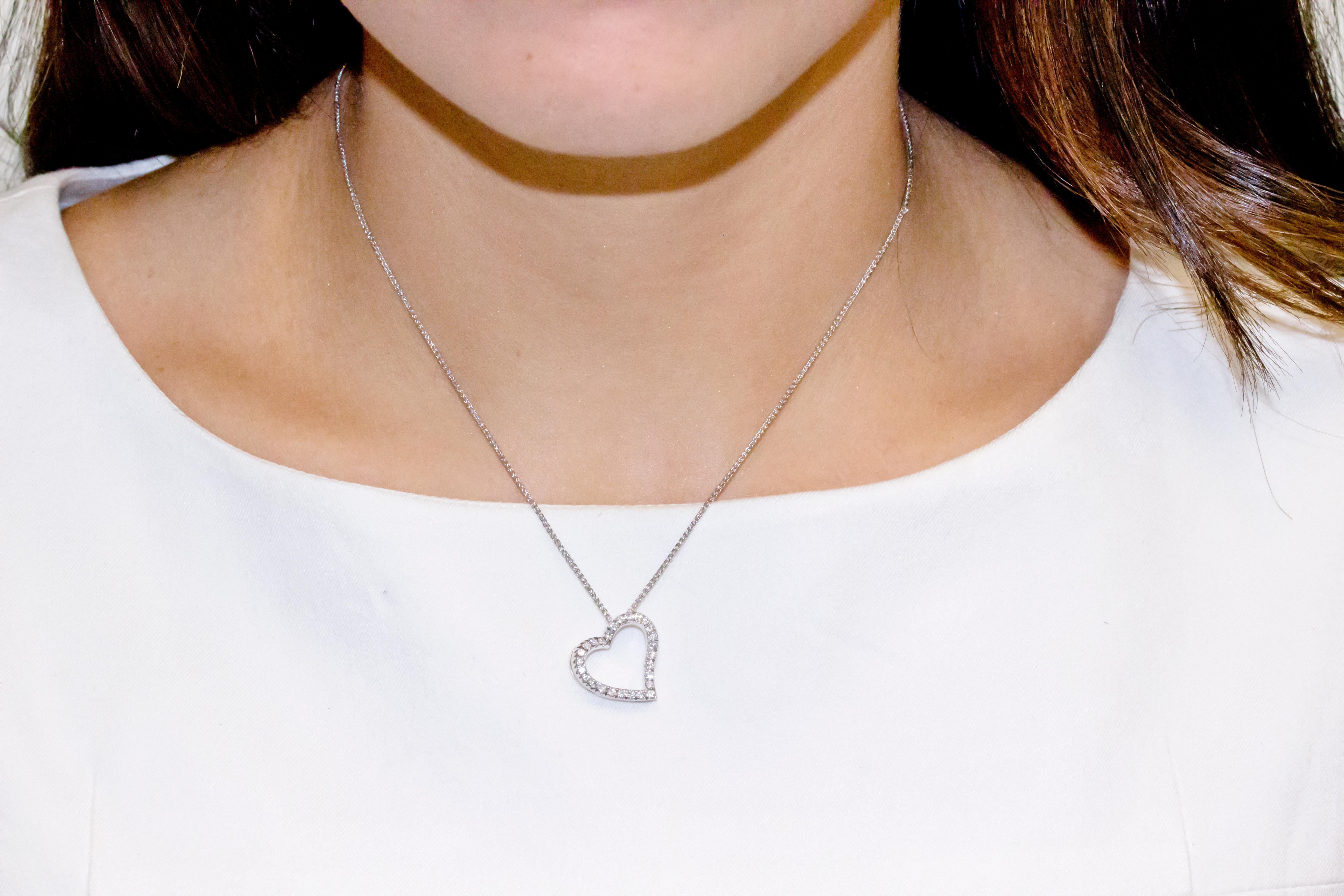 Modern 18 Karat White Gold Curved Heart Diamonds Pendant Necklace For Sale