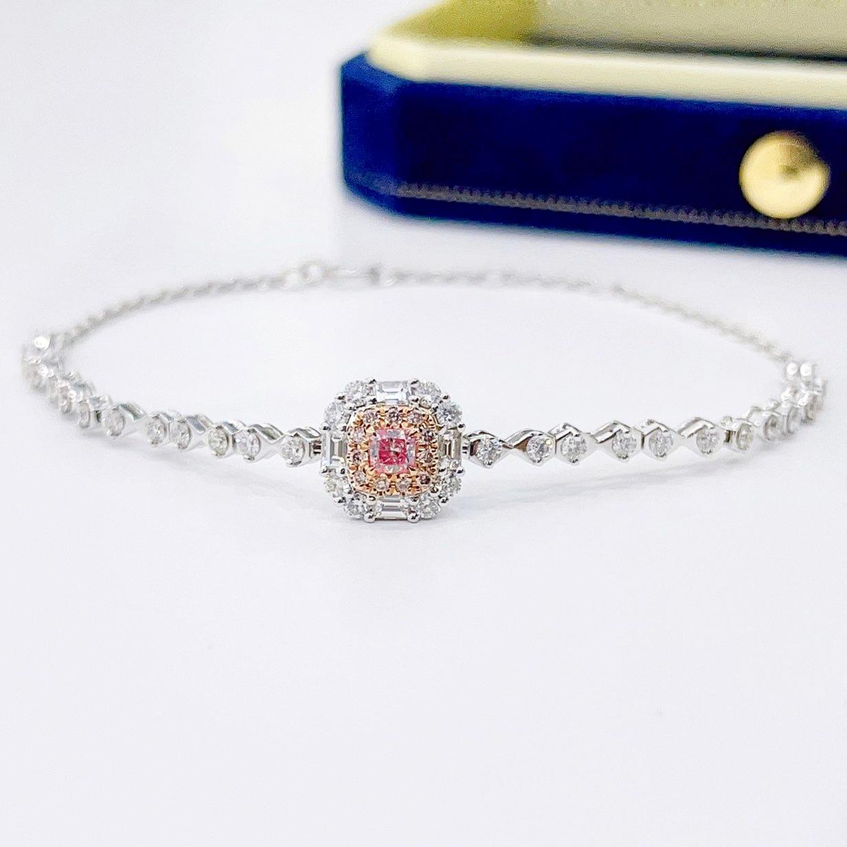 18K White Gold Cushion-Cut Fancy Pink Diamond Bracelet with Diamonds

1 Pink Diamond - 0.15 CT
Diamonds - 0.92 CT (VS; F Colour)
18K Gold - 4.9 GM

The pink diamond is a captivating and rare gemstone, its hue evoking the most delicate and precious