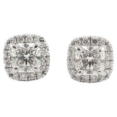 Orecchini a perno con diamante a raggiera in oro bianco 18K
