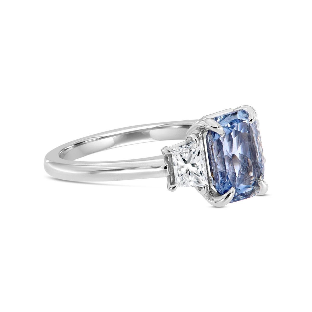 
This Timeless 18K White Gold Three-stone ring features a One-Of-A-Kind 2.42-carat 