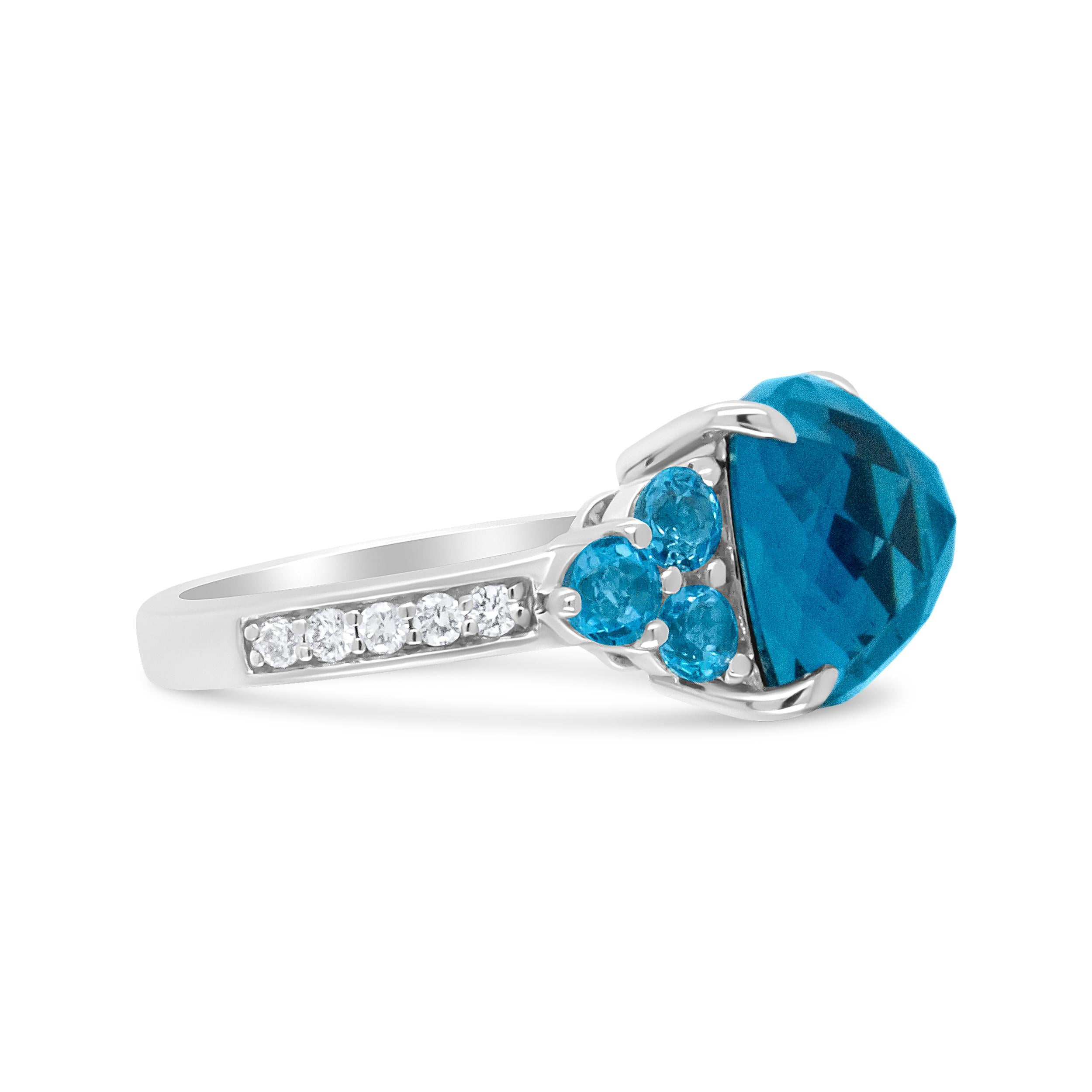 Contemporary 18K White Gold Cushion Shaped Blue Topaz & 1/6 Carat Diamond 3 Stone Style Ring For Sale
