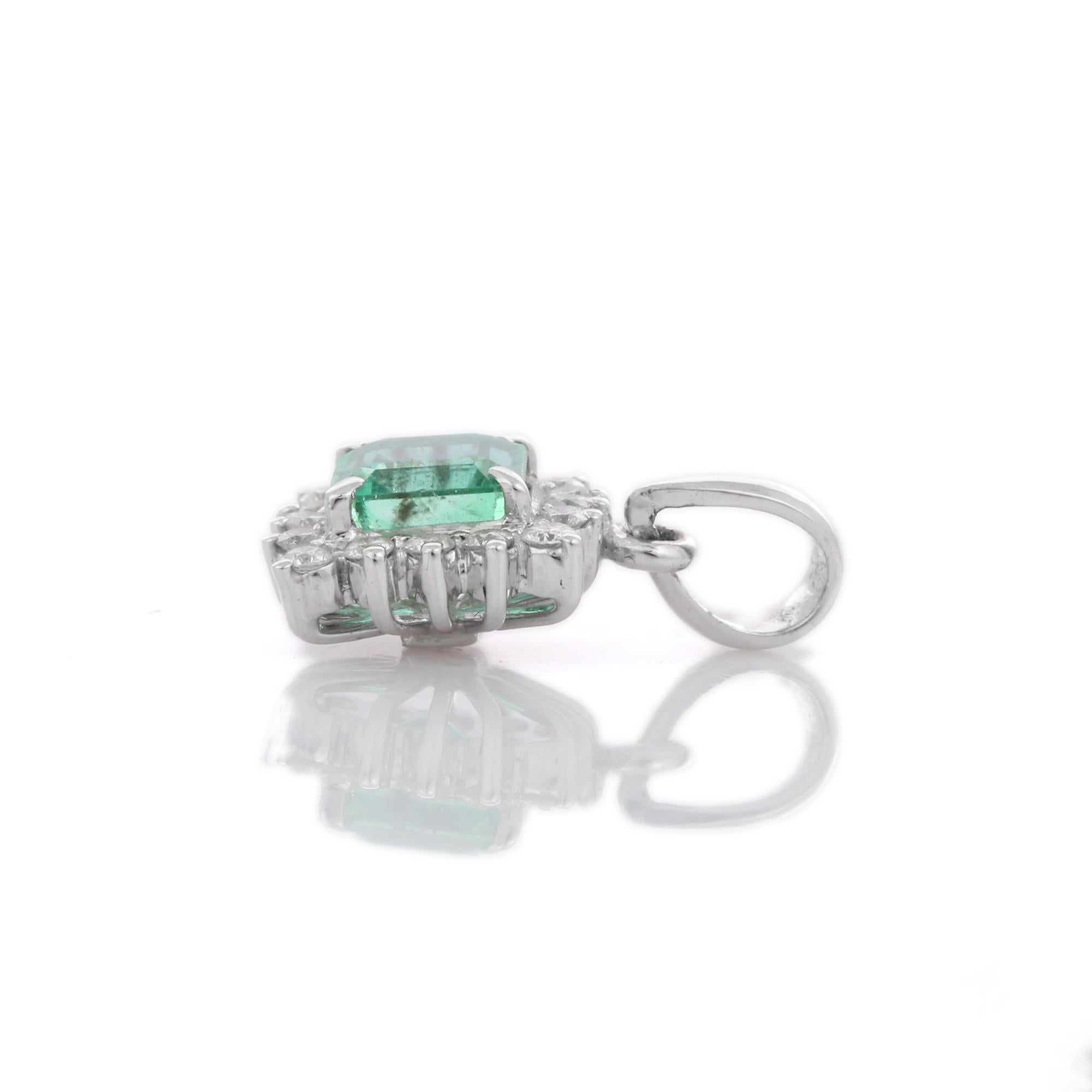 Emerald pendant in 18K Gold. It has a cushion cut emerald studded with diamonds that completes your look with a decent touch. Pendants are used to wear or gifted to represent love and promises. It's an attractive jewelry piece that goes with every
