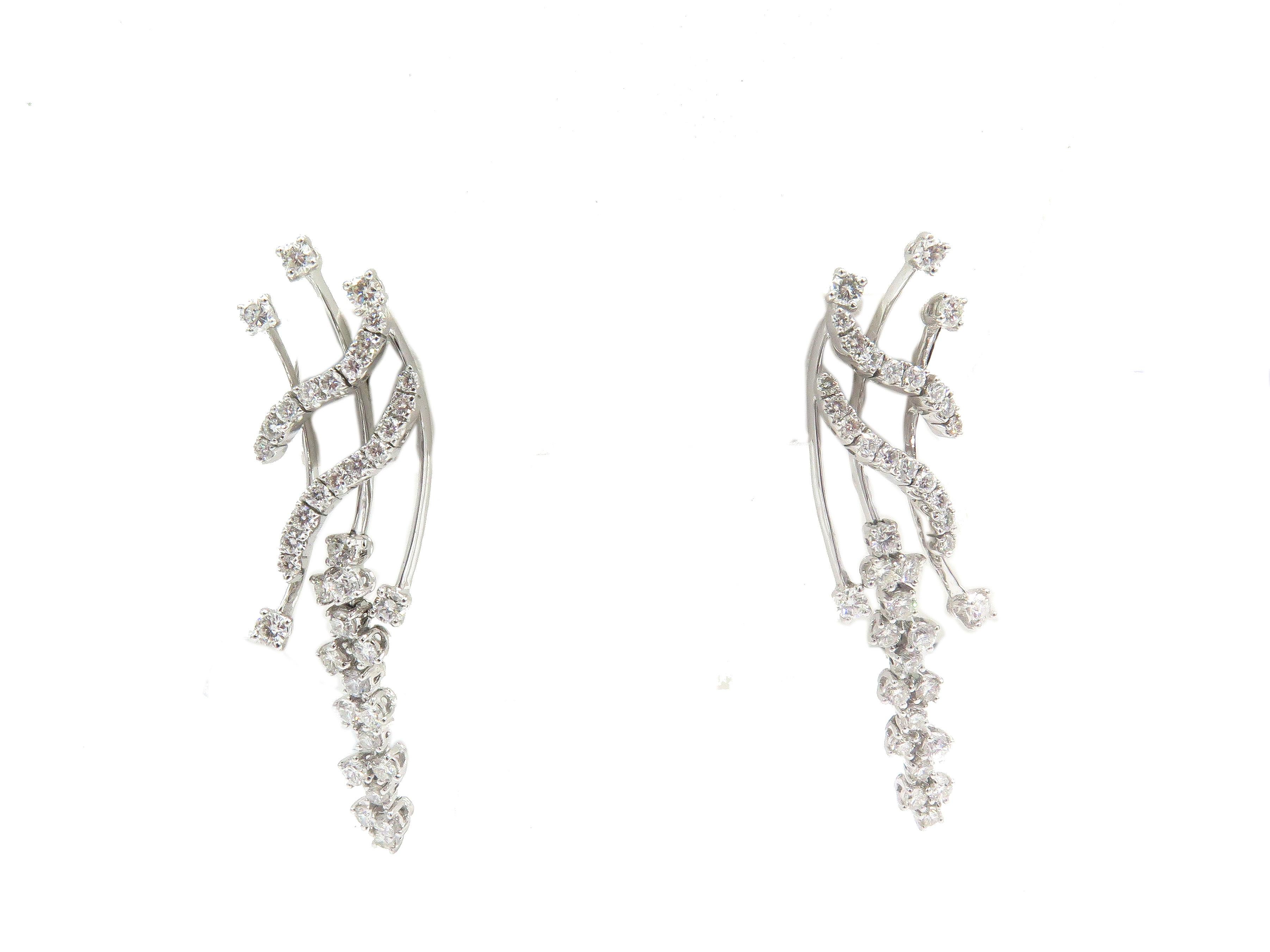 Beautiful, pair of white gold diamond earrings. These, fascinating dangle earrings are 2.0