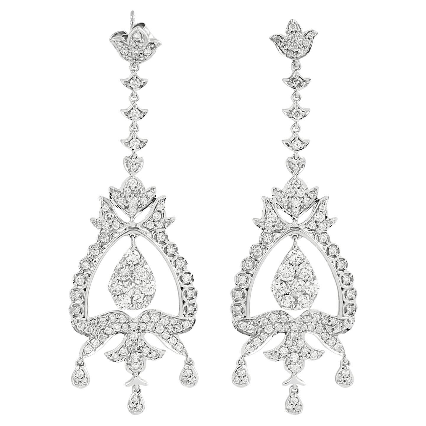 Boucles d'oreilles chandelier en or blanc 18K avec diamants
