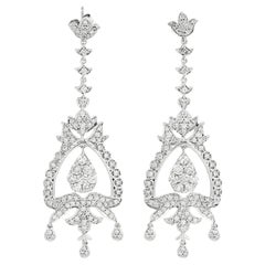 Boucles d'oreilles chandelier en or blanc 18K avec diamants