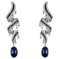18k White Gold Dangling Earrings with Blue Sapphires and Round Cut Diamonds