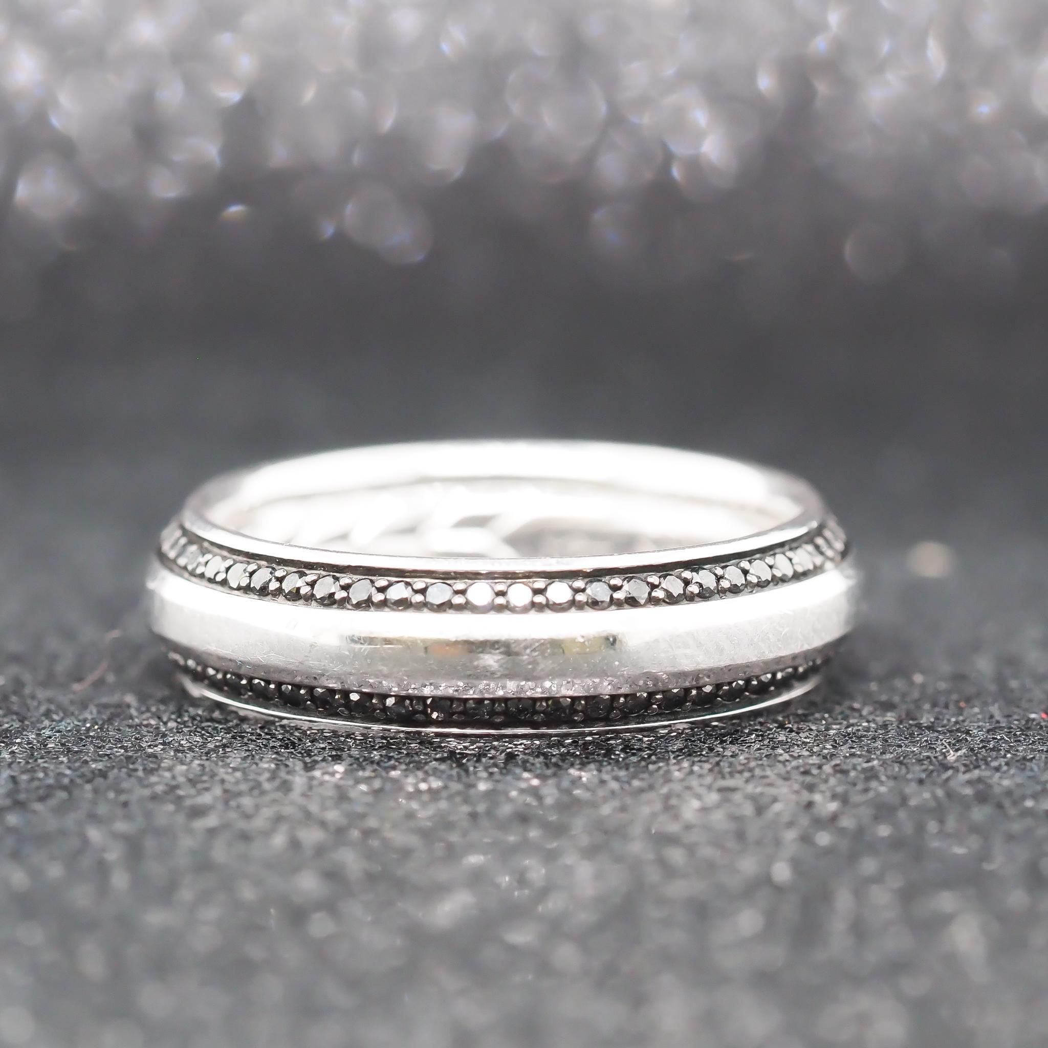 Year: 2000s
Item Details:
Ring Size: 11.5 (Sizable)
Metal Type: 18k White Gold [Hallmarked, and Tested]
Weight: 13.0 grams
Diamond Details:
Pavé-set black diamonds, 0.72 total carat weight
Retail Price as of 10/24 - $4400
Band Width: