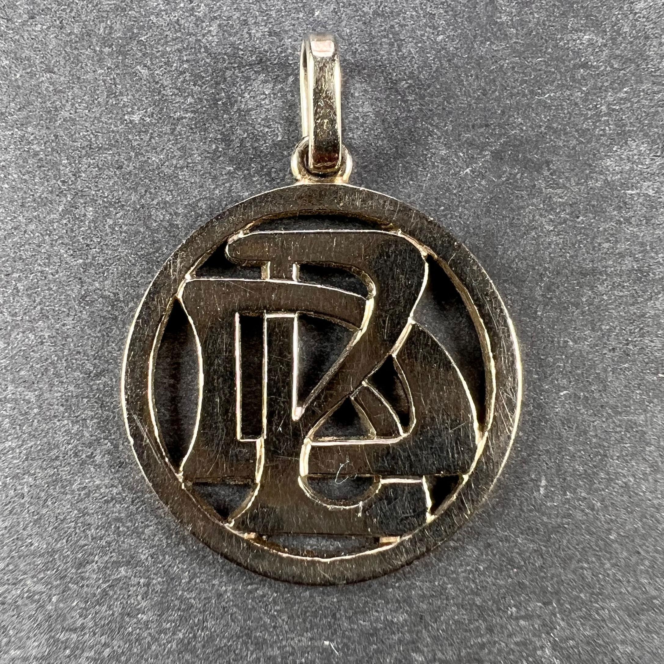 An 18 karat (18K) white gold charm pendant designed as a pierced monogram of the initials BD or DB. Unmarked but tested for 18 karat gold.

Dimensions: 2.2 x 1.9 x 0.1 cm (not including jump ring)
Weight: 3.00 grams 
(Chain not included)