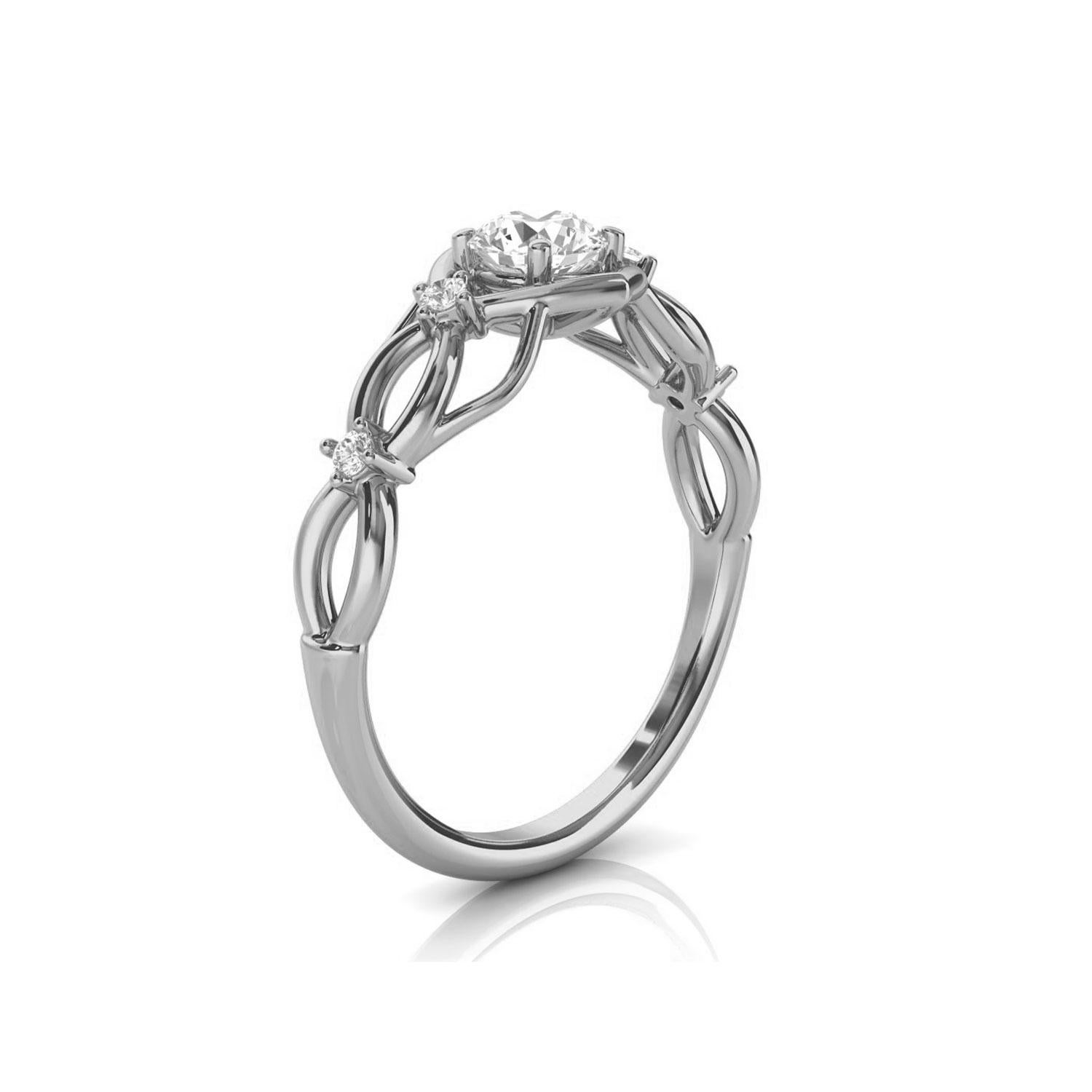 This organically designed ring features a 4.5 mm center diamond ( 0.35 carat) prong set. Two (2) small diamond prong- set along with two layers of wavey delicate metals. We love it! Experience the difference in person!

Product details: 

Center